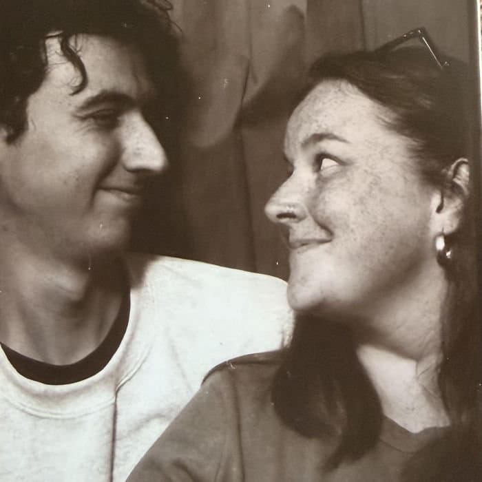 Megan and Devin smiling at each other